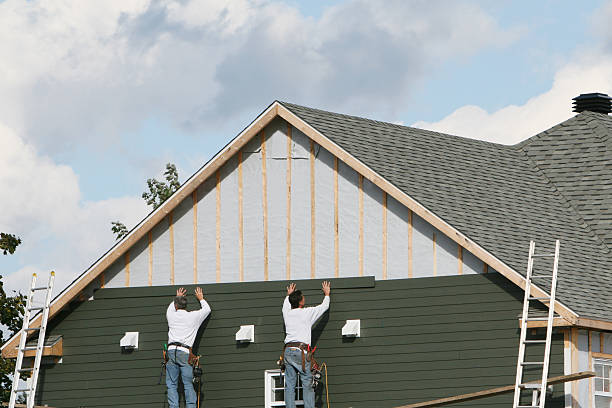 Professional Emergency Siding Repair technician working in Syria, VA